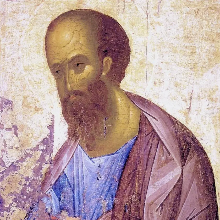 Portrait d'un homme barbu, vêtu d'une tunique bleue et d'un manteau marron, avec un regard pensif.